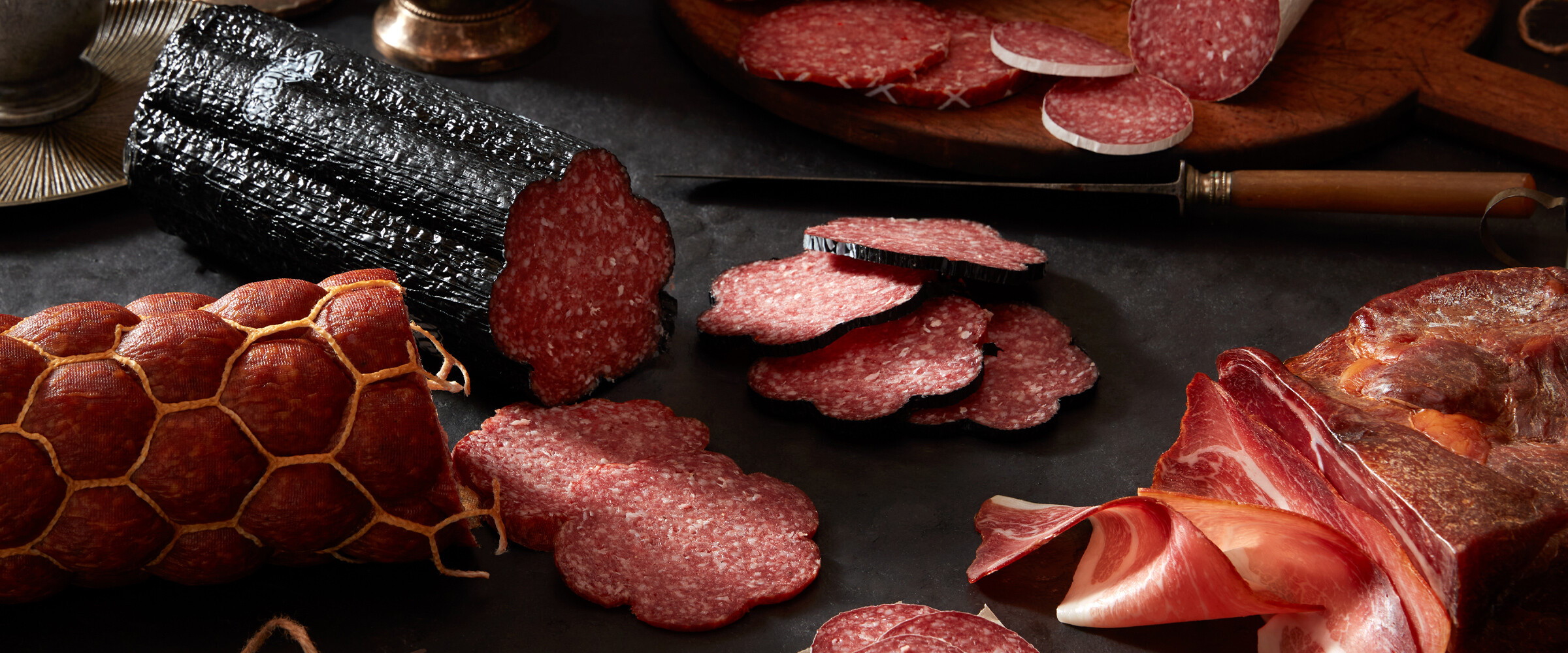 Close up of different kinds of salami.